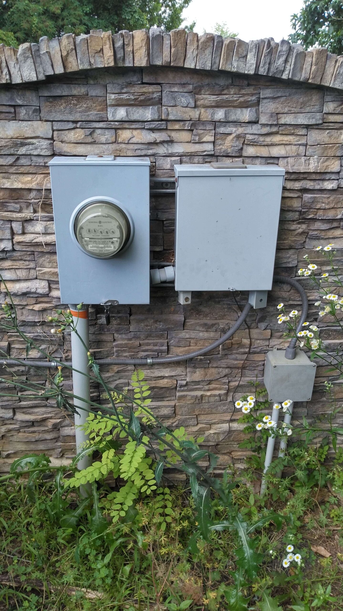 Electrician in Norfolk, VA making an installation